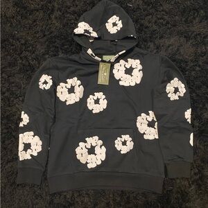 Black and White Denim Tears Hoodie.